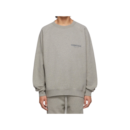 Fear of God Essentials Crewneck Sweater in Heather Oat colorway (front)